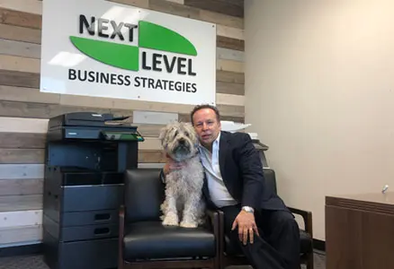 Jim Leivas, founder of Next Level Business Strategies, in the Irvine office