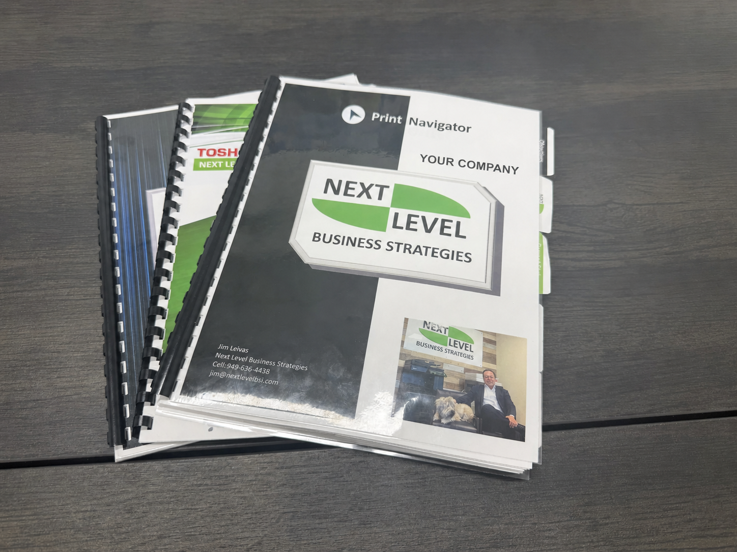 Bound Print Navigator assessment reports with anonymized sample-company branding